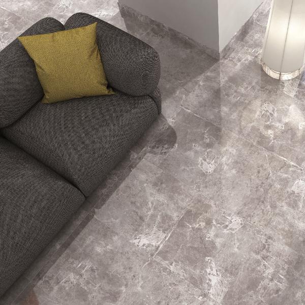 temptation grey marble effect floor tiles in living room with grey couch grande