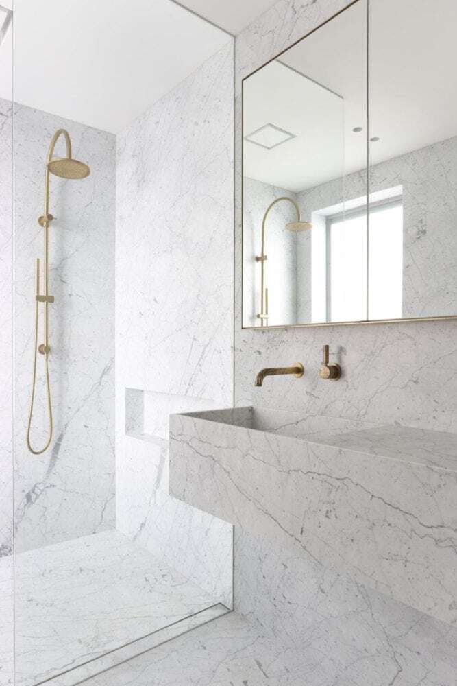 carrara marble bespoke vanity and bathroom walls 2