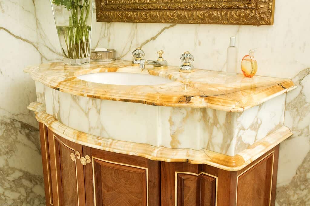 giallo sienna and arabescato marble vanity