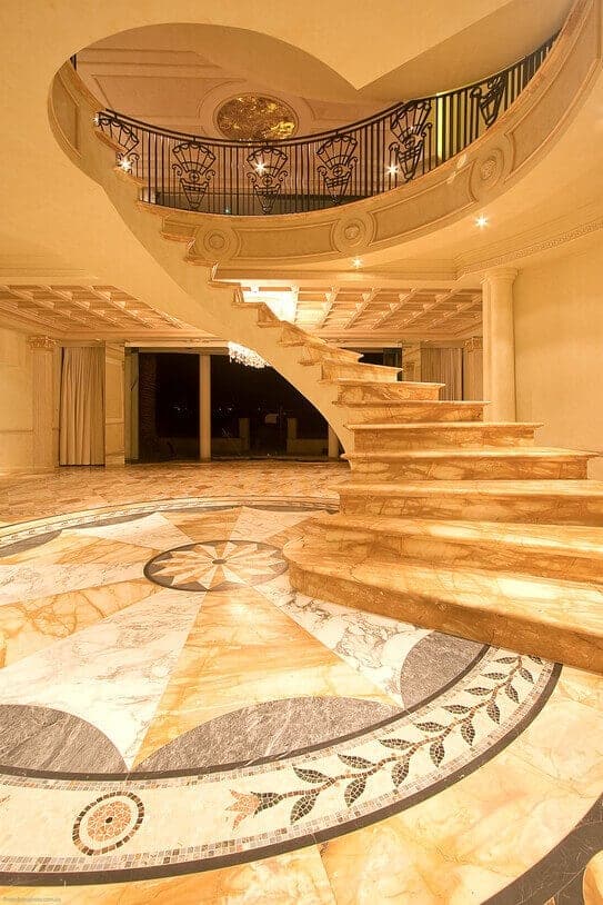 giallo sienna marble entry foyer and staircase