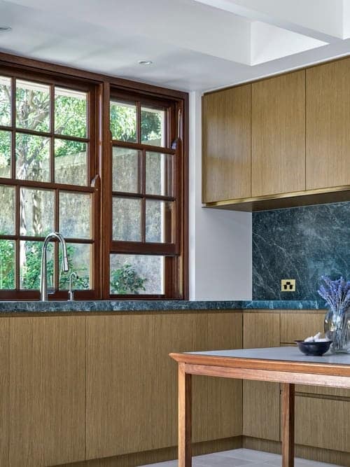 multicolour green kitchen benchtop and splashback