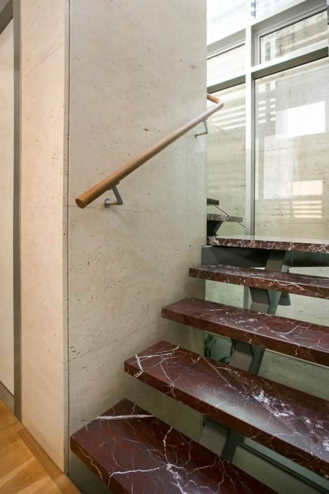 rosso lepanto step treads and travertine navona lift surround