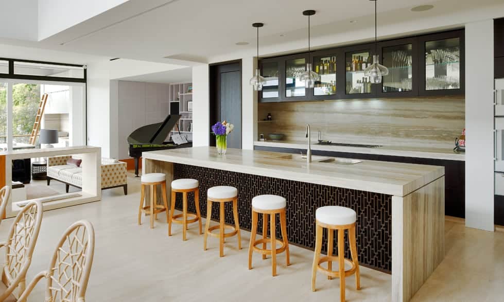 silver travertine kitchen island and splashback