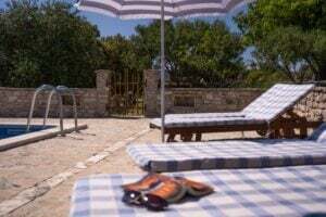 Stone Pavers Vs Concrete For Your Pool Area