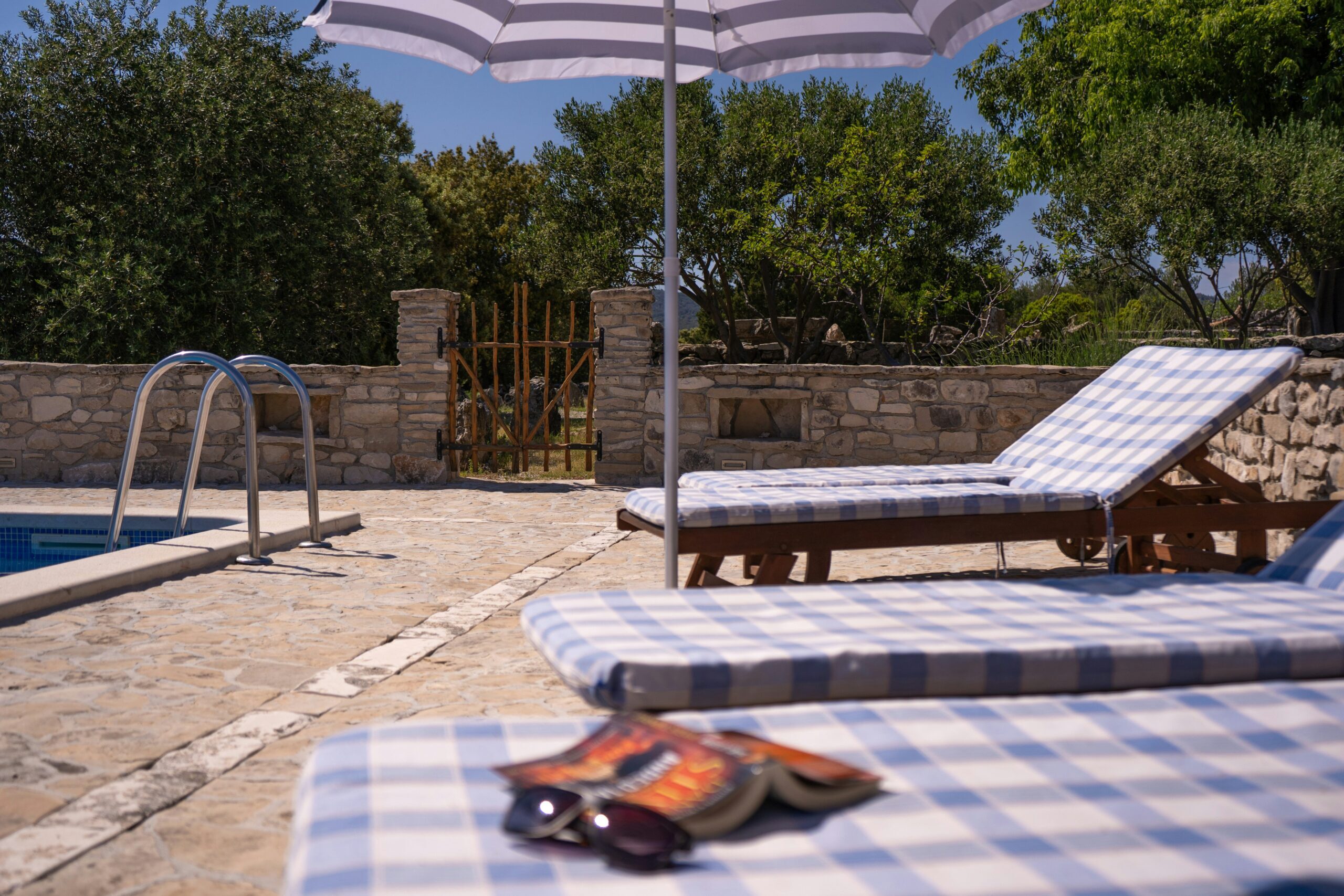 Stone Pavers Vs Concrete For Your Pool Area