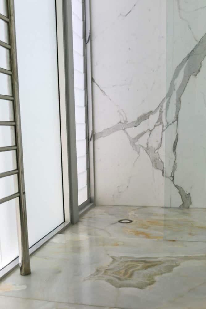 calacatta shower wall and white onyx floor calacatta shower wall and white onyx floor