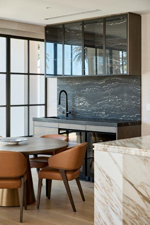 Calacatta Vagli Kitchen Island and Cosmic Black Bar 1