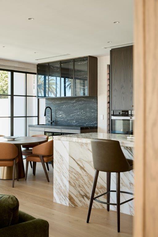 Calacatta Vagli Kitchen Island and Cosmic Black Bar